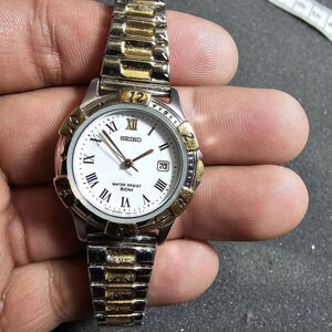 Seiko Ladies Quartz Watch Gold/Silver Tone White Roman Numeral Date Dial Working